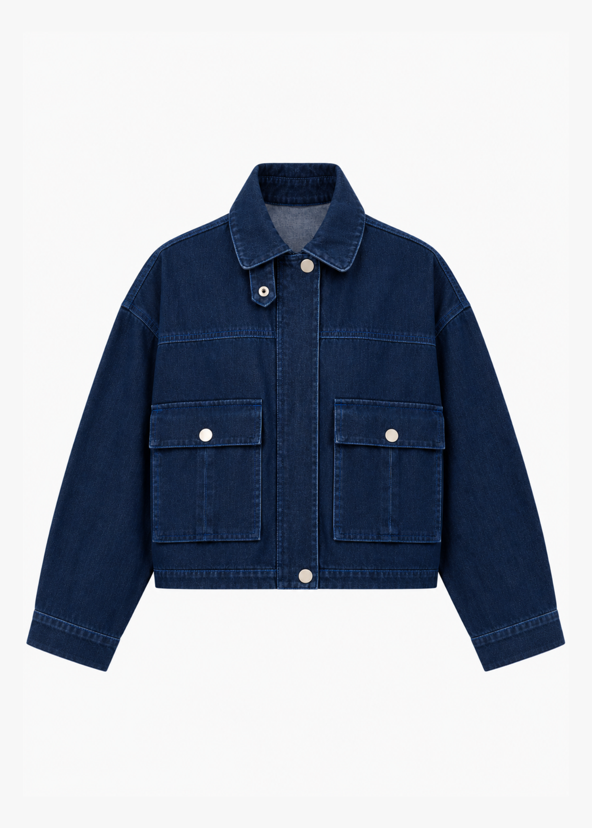 Dark indigo denim utility jacket with tonal blue stitching, silver snap buttons, stand collar with snap tab, oversized flap pockets, and relaxed boxy fit.