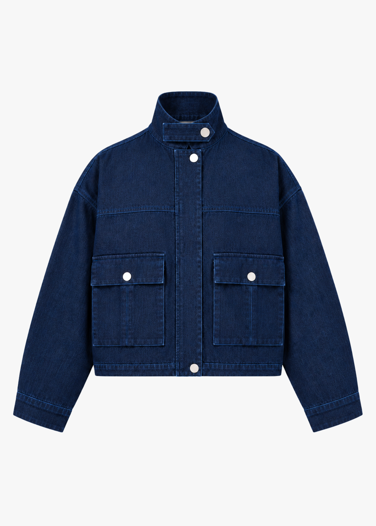 Dark indigo denim utility jacket with tonal blue stitching, silver snap buttons, stand collar with snap tab, oversized flap pockets, and relaxed boxy fit.
